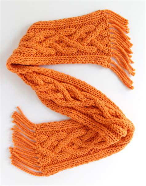 It's fairly easy, and it's a wonderful craft to give to a special someone. Quad Cable Knit Scarf Pattern | AllFreeKnitting.com
