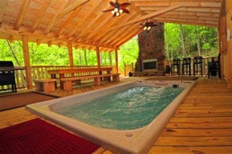 Big bear manor spa cabins are a couple's romantic paradise. Fishing just steps away from cabin, Play in Swim Spa or ...