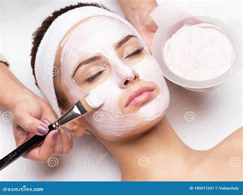 Woman Receiving Facial Mask In Spa Beauty Salon Stock Image Image Of