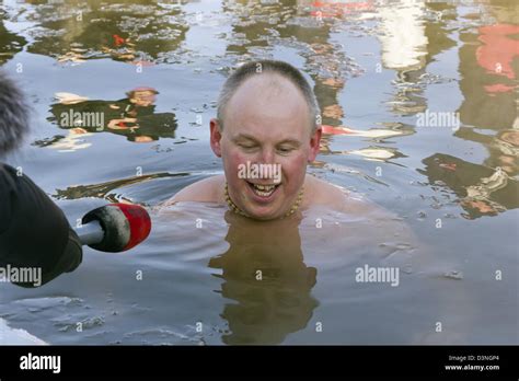 Vilnius Lithuania February 4 Fans Of Winter Swimming Take A Bath In Some Ice Water On