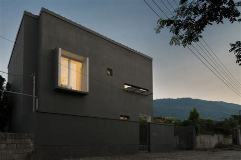 Iranian Holiday Home By Rooydaad Architects Is Black On The Outside And
