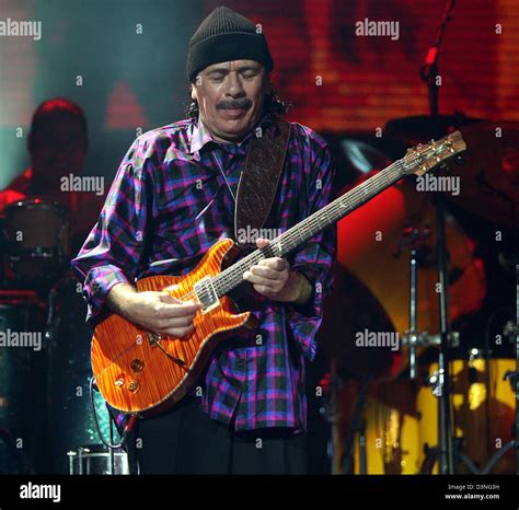 Mexican Superstar Guitarist Carlos Santana Plays His Guitar In The