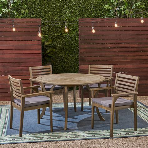 Frederic Outdoor 5 Piece Acacia Wood 47 Round Dining Set With Carved