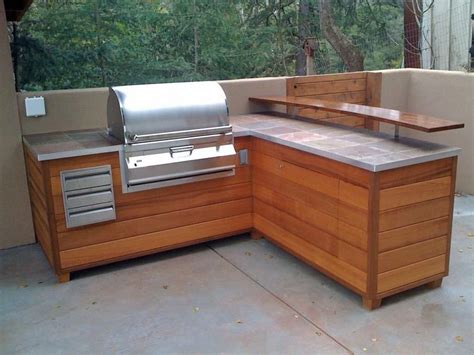 Looking to make a new bold statement in your kitchen? Image result for wood look tiled grill island # ...