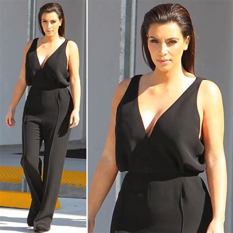 kim kardashian wearing black jumpsuit popsugar fashion