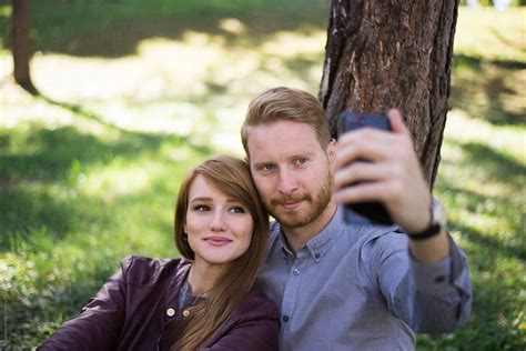 Young Couple In Love Taking Selfie By Stocksy Contributor Mosuno Stocksy