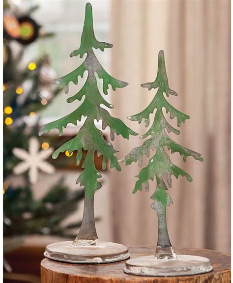 A slight lean in a trunk is expected, but a significant lean, especially when. Col House Designs - Wholesale| Large Metal Pine Tree | Col ...