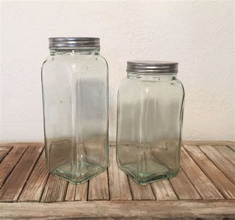 Pair Of Vintage Green Glass Jars With Metal Lids Etsy In 2021 Vintage Green Glass Glass