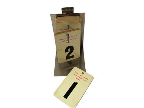 Vintage Take A Number Dispenser