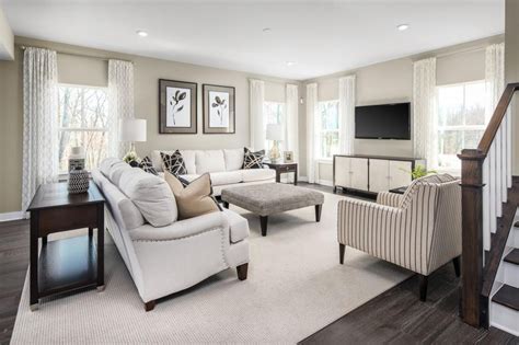 Neutral Monochromatic Living Room With Wall Tv Beige Ivory Brown Black