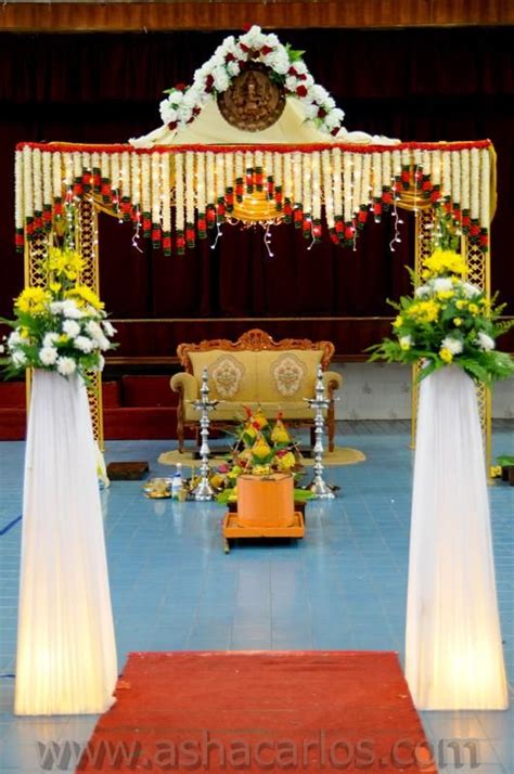 Hindu Temple Wedding Archway With Flowers Fairy Lights And Ganesh