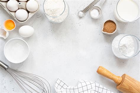Baking And Cooking Ingredients On Bright Grey Background Stock Photo