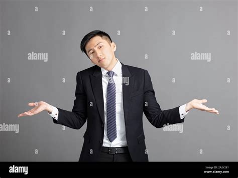 Shrugging Businessman Isolated Asian Chinese Hi Res Stock Photography