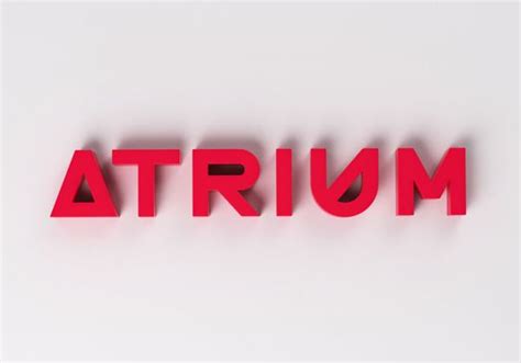 The Word Atrium Spelled In Red Plastic Type On A White Background With