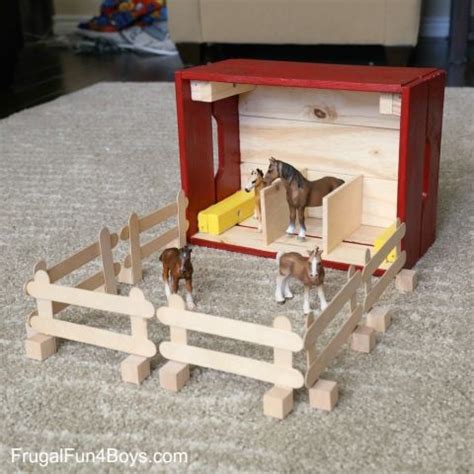 You can save space by stacking 2 boxes on top of one another. IKEA Hack: Knagglig Wooden Crate Horse Stable for Toy ...