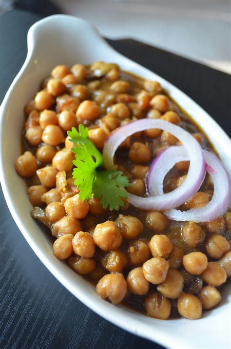 This chole bhature or chana bhatura is a truly delicious punjabi recipe of spiced tangy chickpea curry with soft, fluffy leavened fried bread. Dishing With Divya: Chole Bhature Recipe