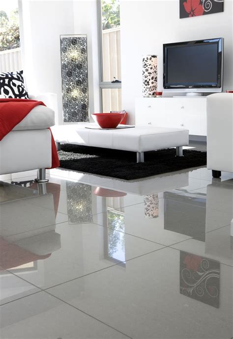 A White Living Room With Black And Red Accents