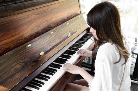 Asian Women Playing Piano Stock Photo Image Of Playing 142425944
