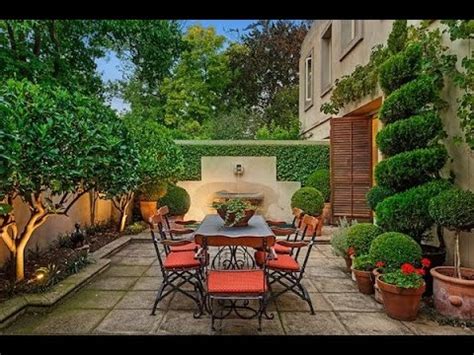 Retractable screens on the extension. Mediterranean Garden Designs - YouTube