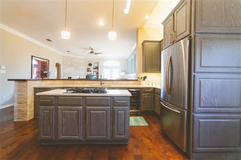 Hampton bay cambridge gray cabinets ∙ plywood construction ∙ shaker door style ∙ soft close drawers. Gray Cabinets Transform a Texas Kitchen - Transitional ...