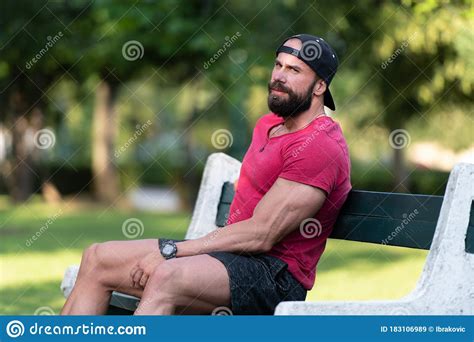 Handsome Guy Resting On Bench Outdoors Stock Image Image Of Nature