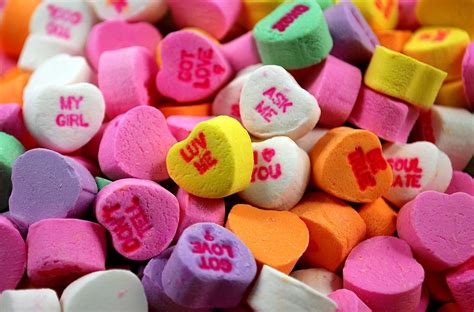 Candy Hearts With The Words I Love You Written On Them