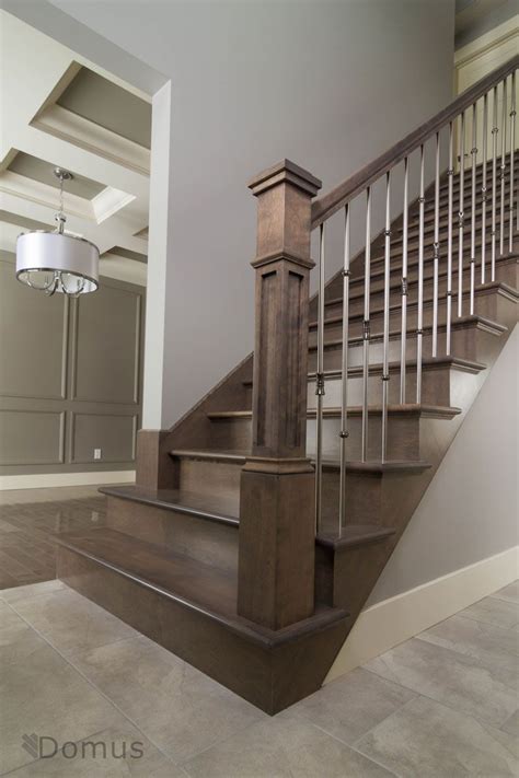 Dark Stained Staircase With Modern Stainless Spindles Stained