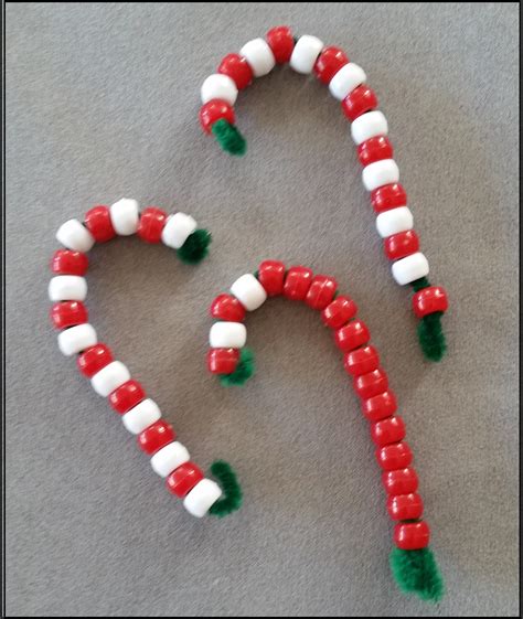 Make a candy cane inspired ornament, a beaded candy cane ornament, and a paper craft. Simple Holiday Crafts for Kids to Make - Virtually Montessori