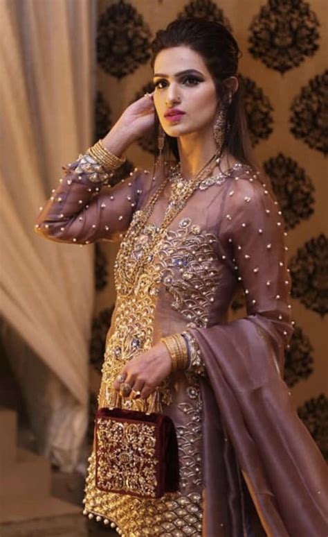 Attend the wedding events in stylish and beautiful pakistani wedding guest dresses with unique designs and mesmerzing embellishments. Pin by Haseeb on Wedding clothes (With images) | Cute ...