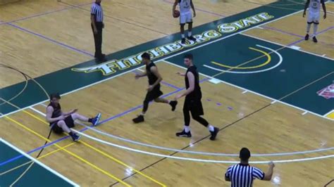 College Basketball Player Knocks Out Opponent With Elbow Youtube