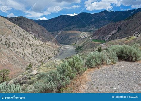 Scenic Desert Canyon Of Muddy Fraser River In Cloudy Weather In Summer