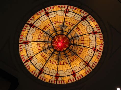 illuminated stained glass domed ceiling in the lobby of the marriott world financial center in