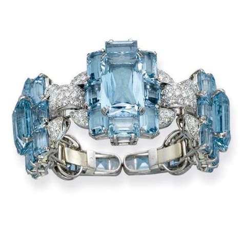 A Rare And Superb Art Deco Aquamarine And Diamond Bangle By Cartier