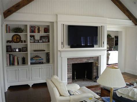 25 Ways To Hide The Tv The Ultimate Guide Tv Above Fireplace Tv