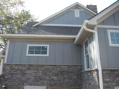 Side Of The House In Hardie Board And Batten Gray Slate Brick House