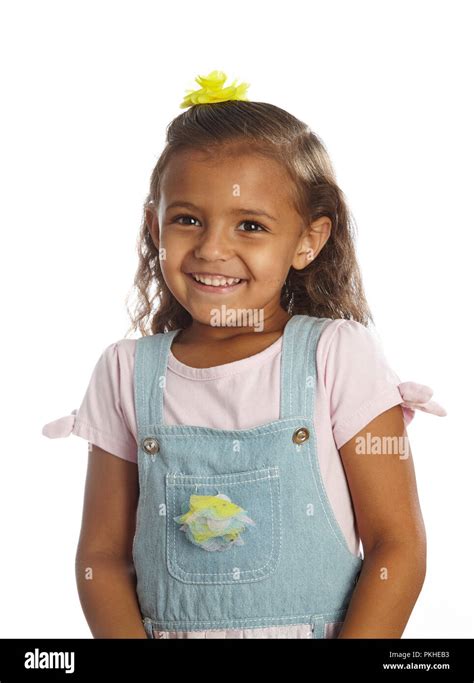 Little Girl In Overalls Stock Photo Alamy