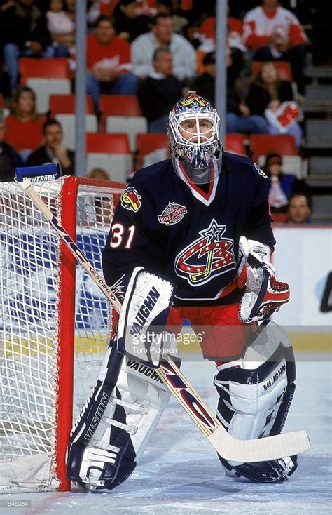 Repin your favorites from our page or tag @bluejacketsnhl to share your pins with us! Goalie Ron Tugnutt of the Columbus Blue Jackets waits as he guards... | Columbus blue jackets ...