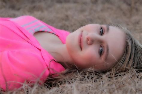 Free Stock Photo Of Smiling Teenage Girl Lying On Grass Download Free Images And Free