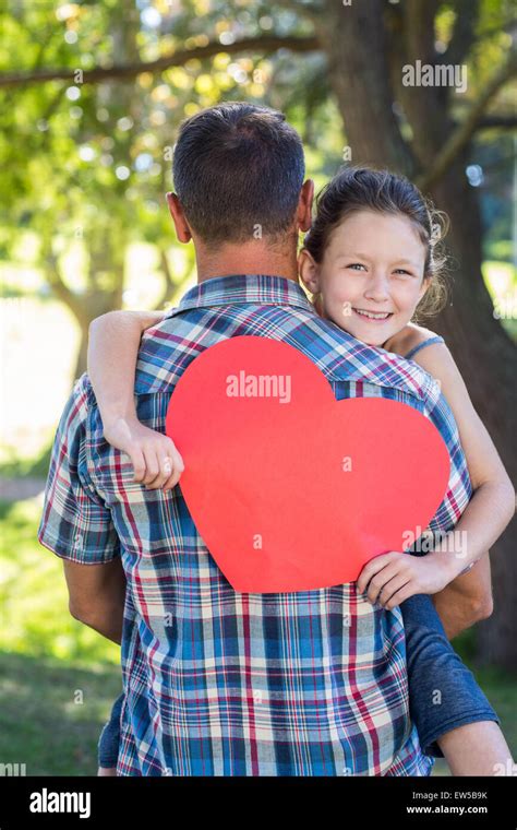 Father And Daughter Hugging In The Park Stock Photo Alamy