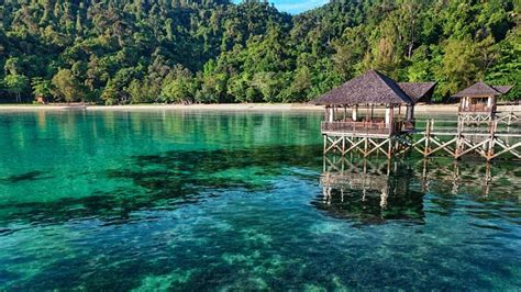 Sit back and relax on the beach with complimentary cabanas, umbrellas, and sun loungers. Bunga Raya Island Resort & Spa, Gaya Island - Compare Deals