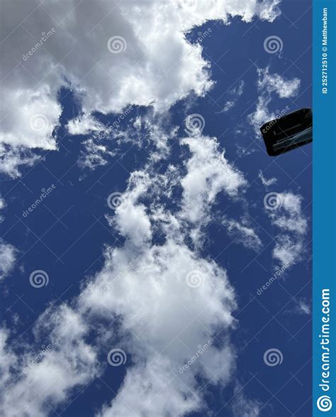 Clouds High In The Skay Over Lake Simcoe In Barrie Ontario With Orange