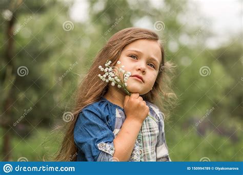 girl with lily of the valley in nature stock image image of valley bouquet 150994789