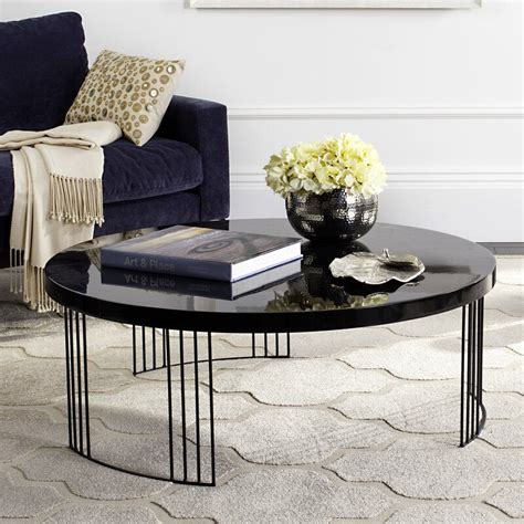 Solid wood coffee tables are often a very good choice for a neutral look. Keelin 3 Legs Coffee Table | Coffee table, Black coffee ...
