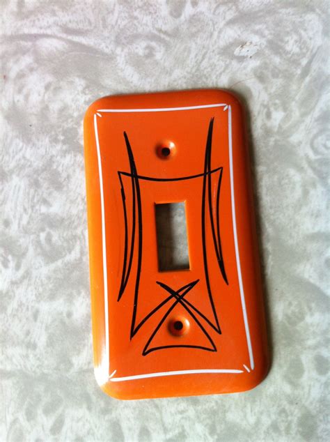 See more ideas about light switch covers, decorative light switch covers, light switch. Vintage metal pinstriped light switch cover (orange, black ...