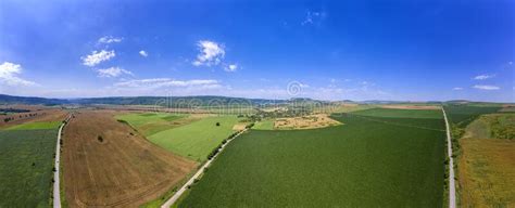Vast Panorama View From Drone To The Countryside Roads And Fields Stock