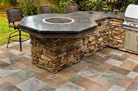 Get to work on building an elegant stone and wood grill station, or spruce up your outdoor bar with smooth. Outdoor Kitchen Designs