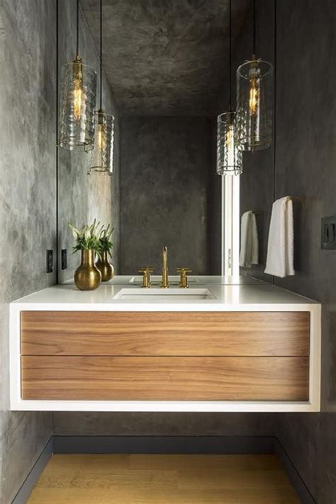 Chic Modern Powder Room Is Lit By Rippled Glass Light Pendants Hung In
