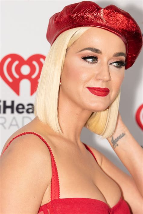 Busty Singer Katy Perry Showcasing Her Cleavage In A Red Dress The