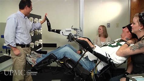 Paralyzed Man Moves Robotic Arm With His Thoughts Youtube