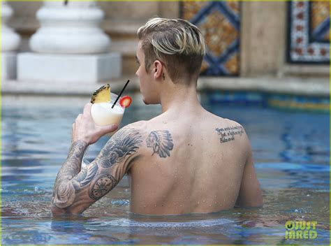 justin bieber goes shirtless for a swim at the versace mansion photo 3528487 justin bieber